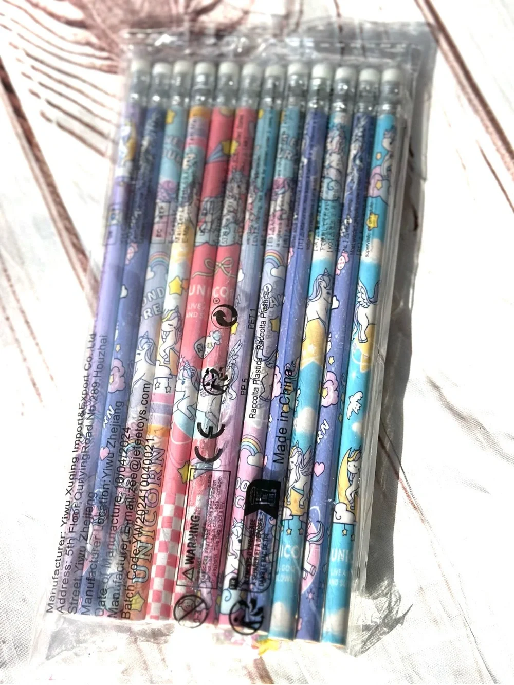12 Rainbow Unicorn Pencil Set with Pastel Designs and Eraser Toppers